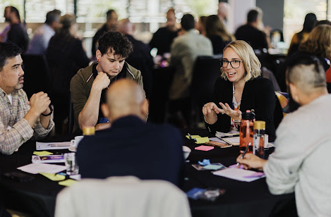 Sammi Hinds facilitating a professional conversation at a workshop